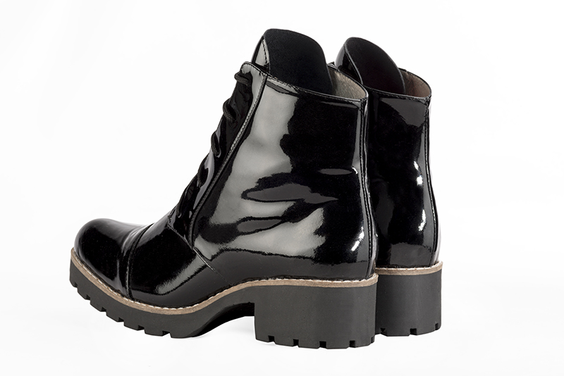Women's gloss black elegant ankle boots, with laces at the front. Round toe. Thick rubber soles - Rear view